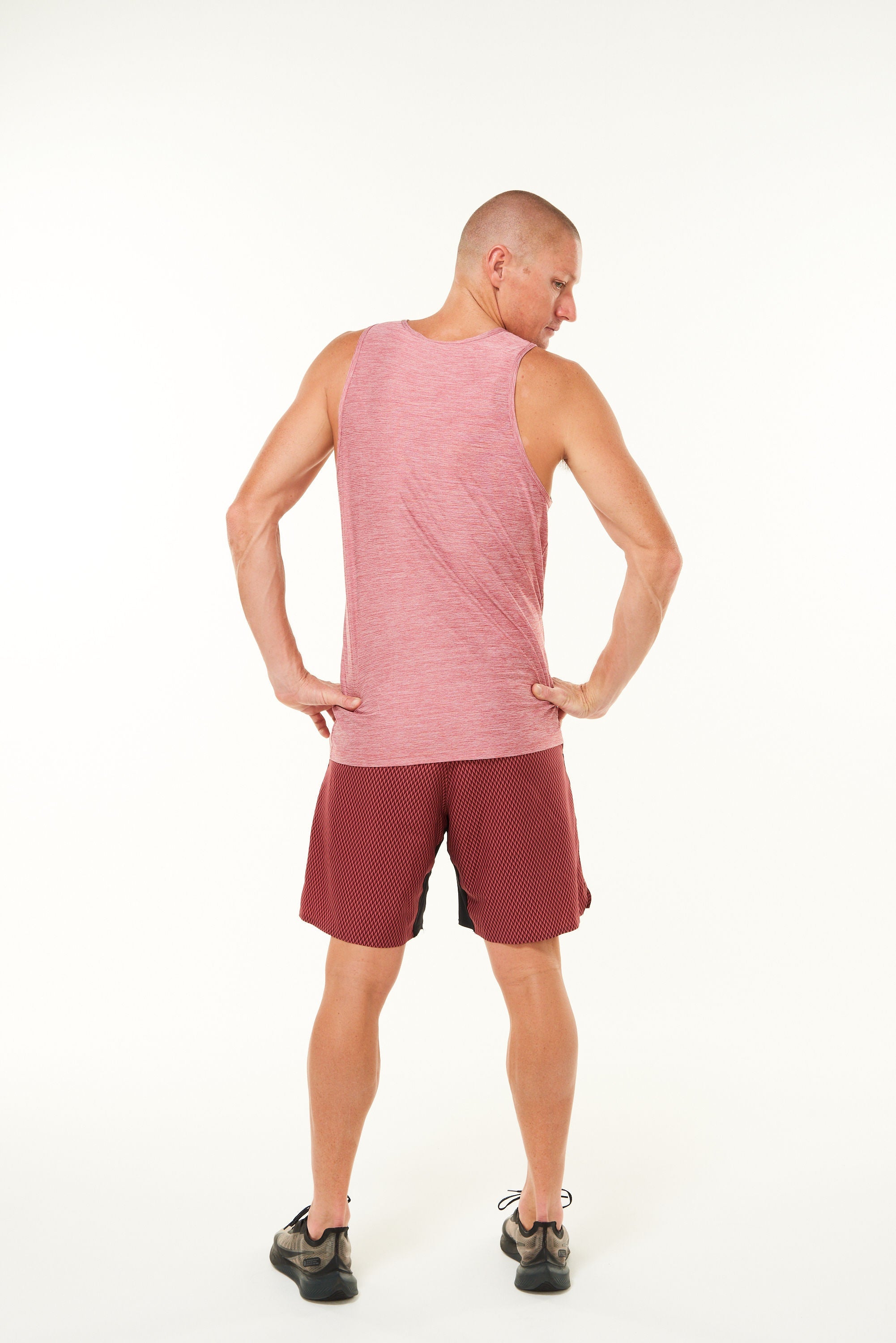 Back view of Men's Cool It Tee. Red running singlet. Technical tank top with to keep you cool.