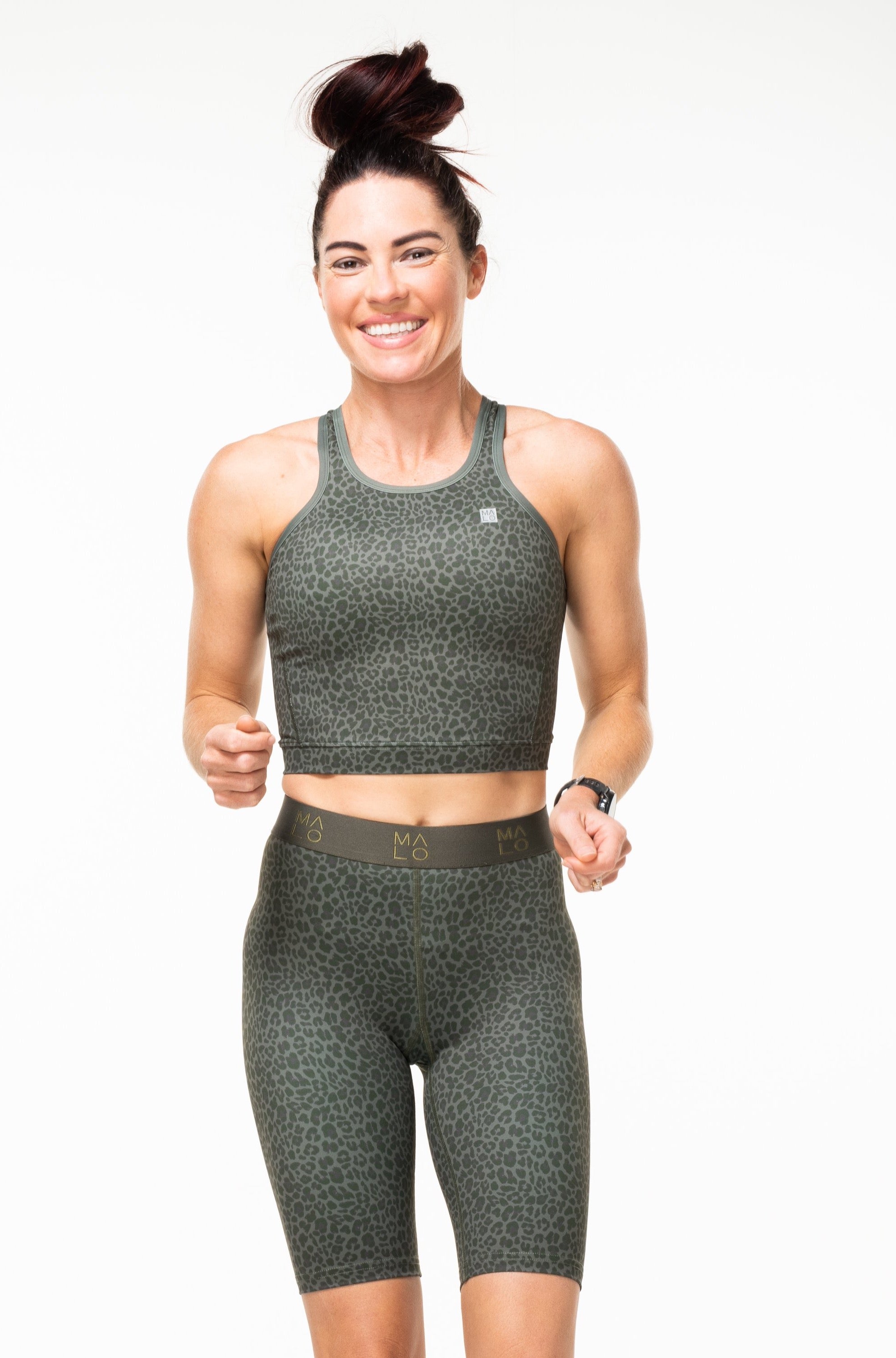Panther Pedal Pumpers. Longer shorts with light compression. Olive green workout shorts that go to the knee.