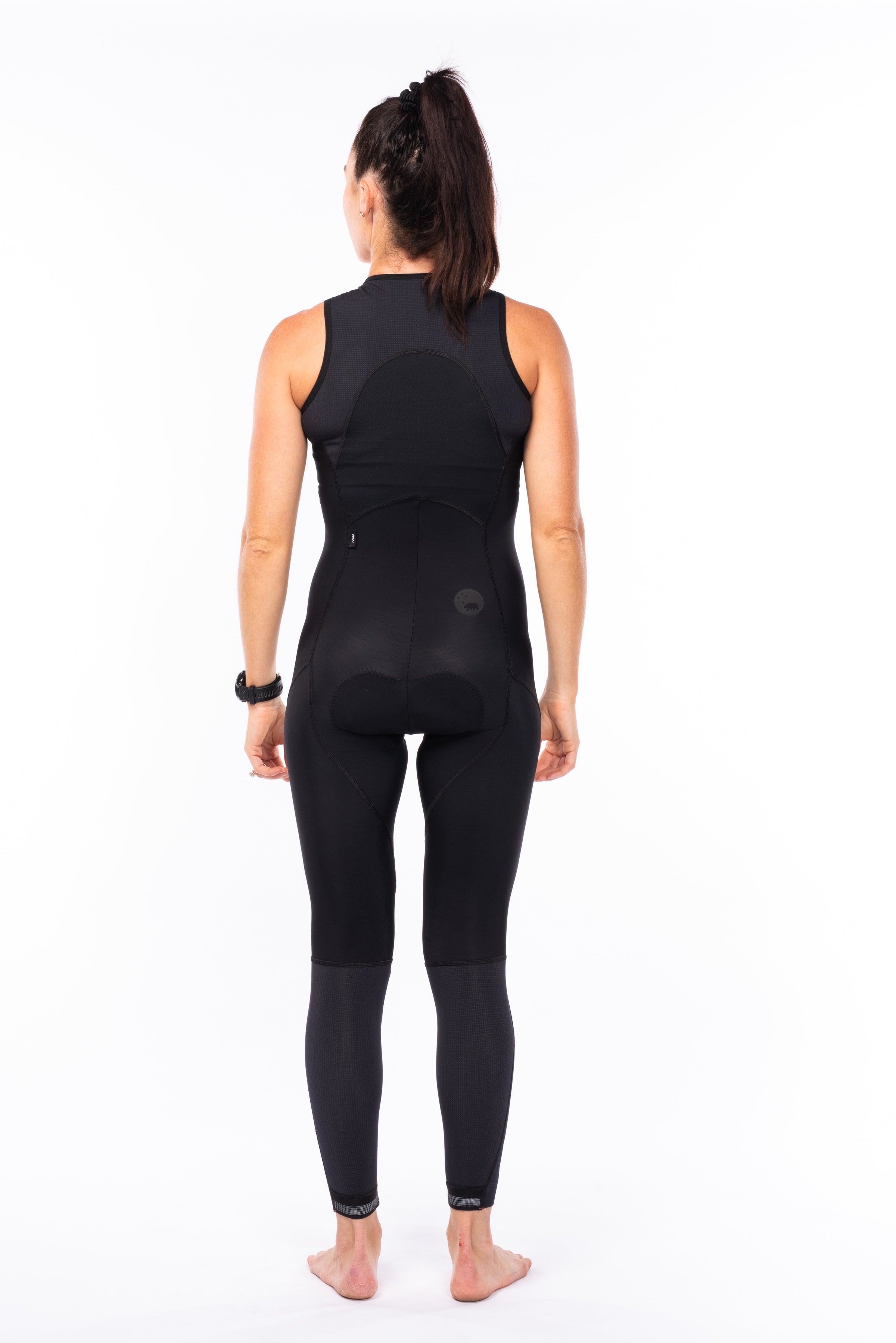 Back view of women's thermal cycling tights. Cycling pants with thermal lining and a back pocket.