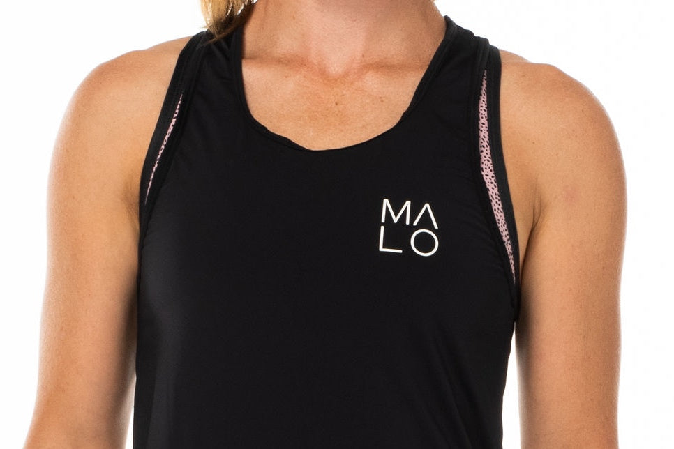 Close view Black Endure Tank. Sleeveless top with white logo on left side.