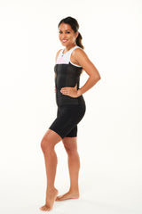 Modeling left side of women's tri classics sleeveless top. Aerodynamic tri top with ventilated side panel.