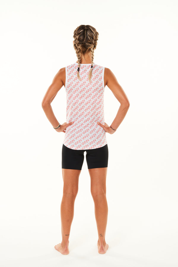 Back of Signature Women's Sleeveless Base Layer. Cycling base layer with coral diagonal logo stripes.