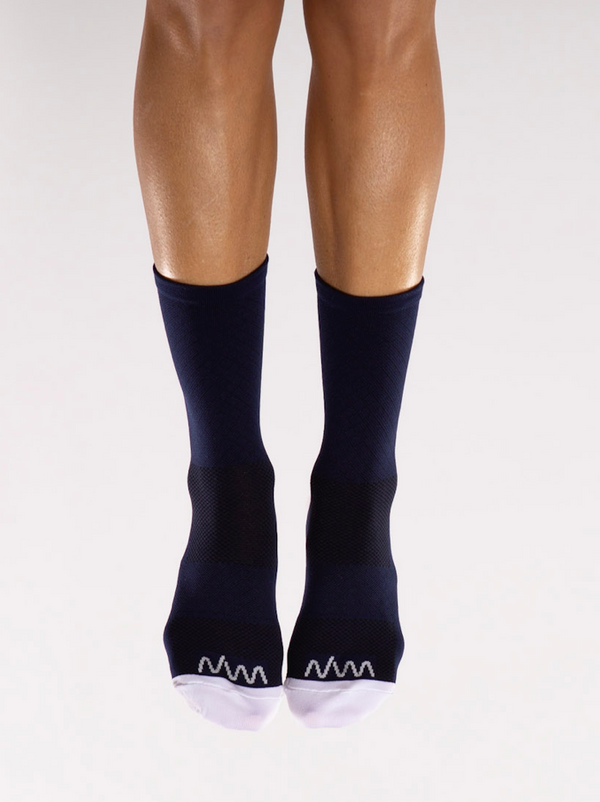 Front view WYN republic Navy Flagship Socks. Navy mid-calf running/cycling socks with white toe box.
