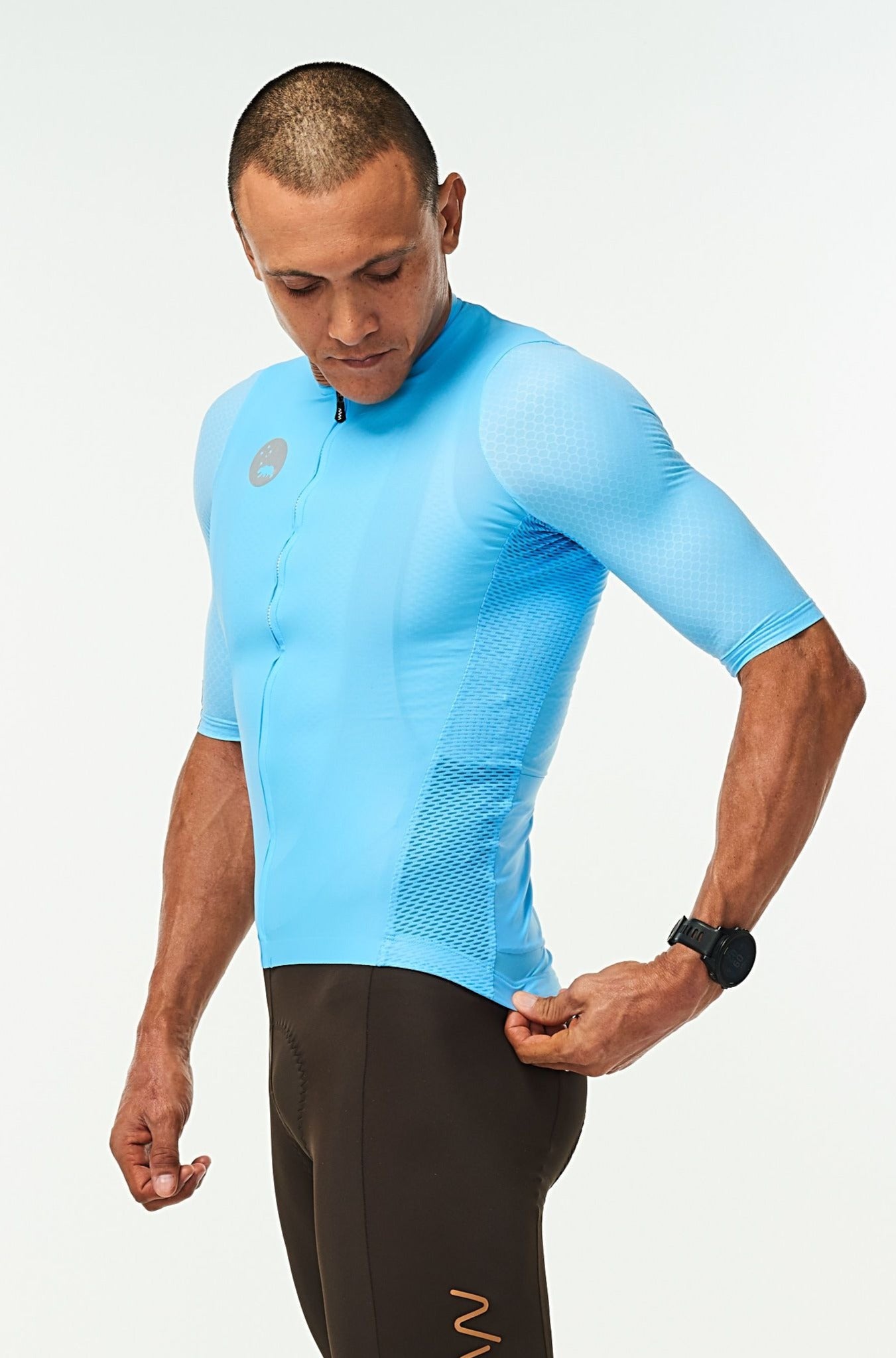 Left side of men's Hex Racer Jersey. Blue cycling jersey with mesh panels for ventilation.
