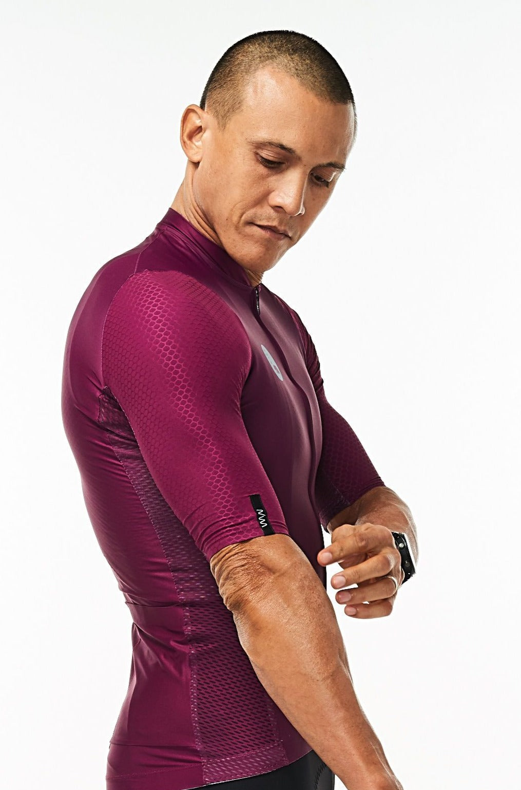 Right arm of men's Tyrian Hex Racer Jersey. Purple aerodynamic sleeves with Italian Hex fabric.