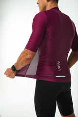 Back left angle of unzipped Tyrian Hex Racer Jersey. Breathable Italian fabric.