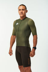 Left side of men's Hex Racer Jersey. Green cycling jersey with mesh panels for ventilation.